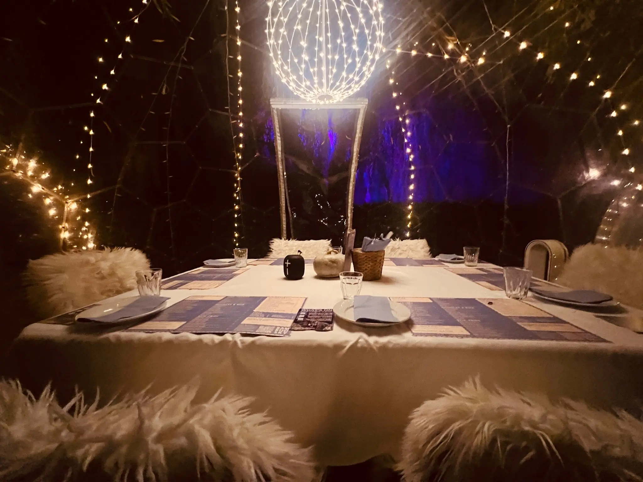 Dome dining table set up with fairy lights