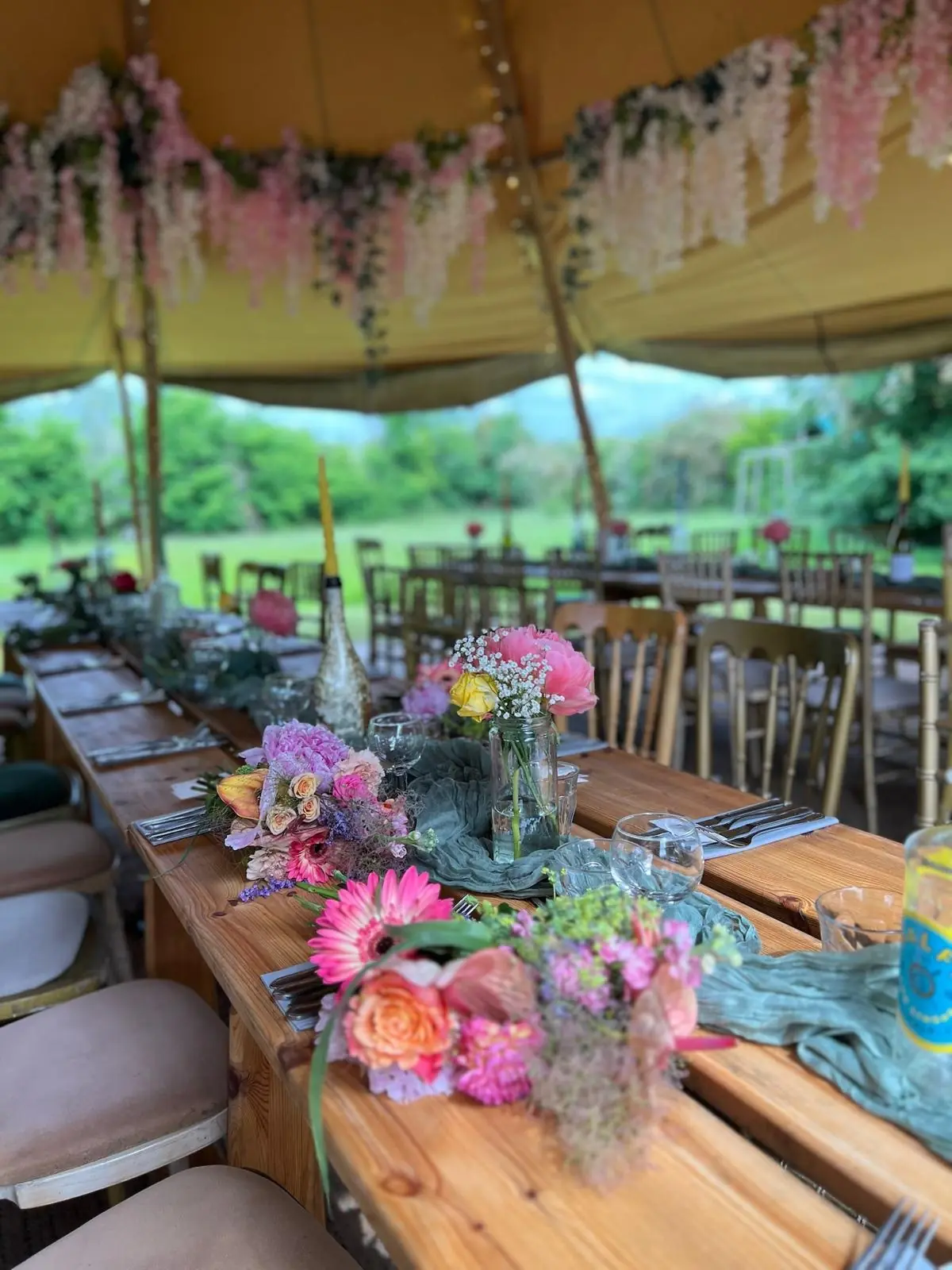 Wedding table setup inside the tipi with flowers