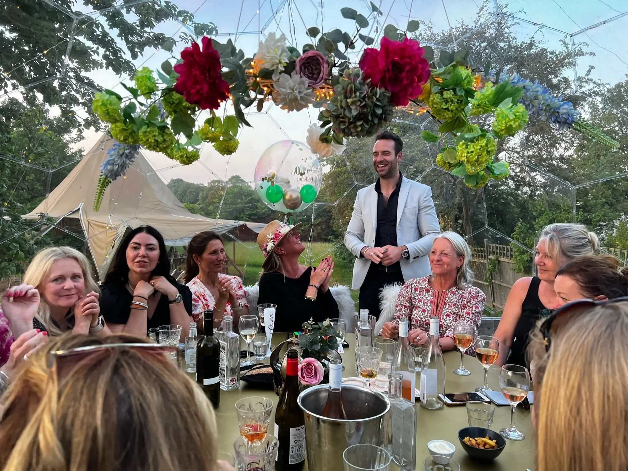 Group celebration dining inside a dome